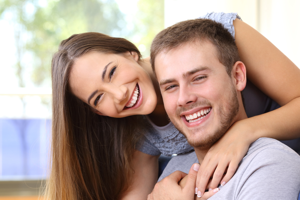 Healthy, Natural Smiles With Dental Implants – Dental Implants in Palm Desert A happy couple smiling together, representing renewed confidence, function, and quality of life after dental implants in Palm Desert – Dental Implants in Palm Desert