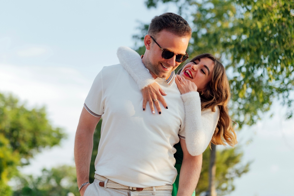 Happy Couple with Radiant Smiles – Dentist in Rancho Mirage, CA A cheerful couple shares a joyful moment outdoors, showcasing confidence and happiness with their bright smiles – Dentist in Rancho Mirage, CA.