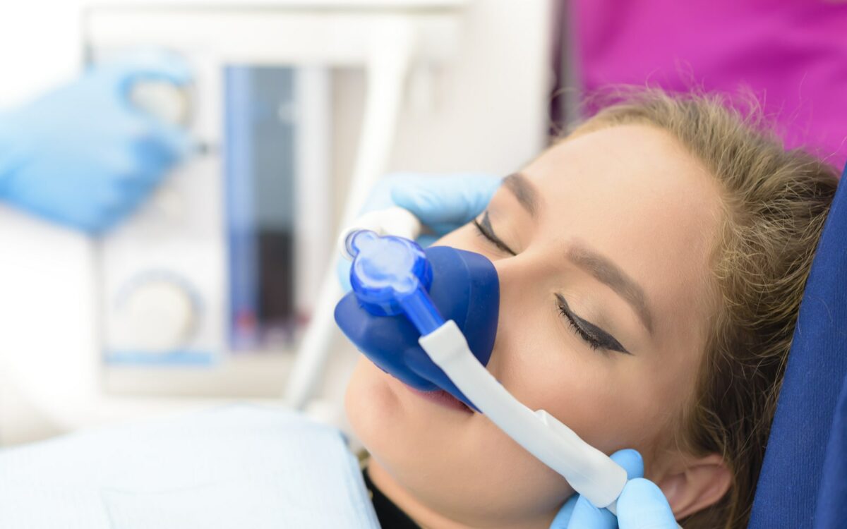 Woman undergoing sedation for dentistry