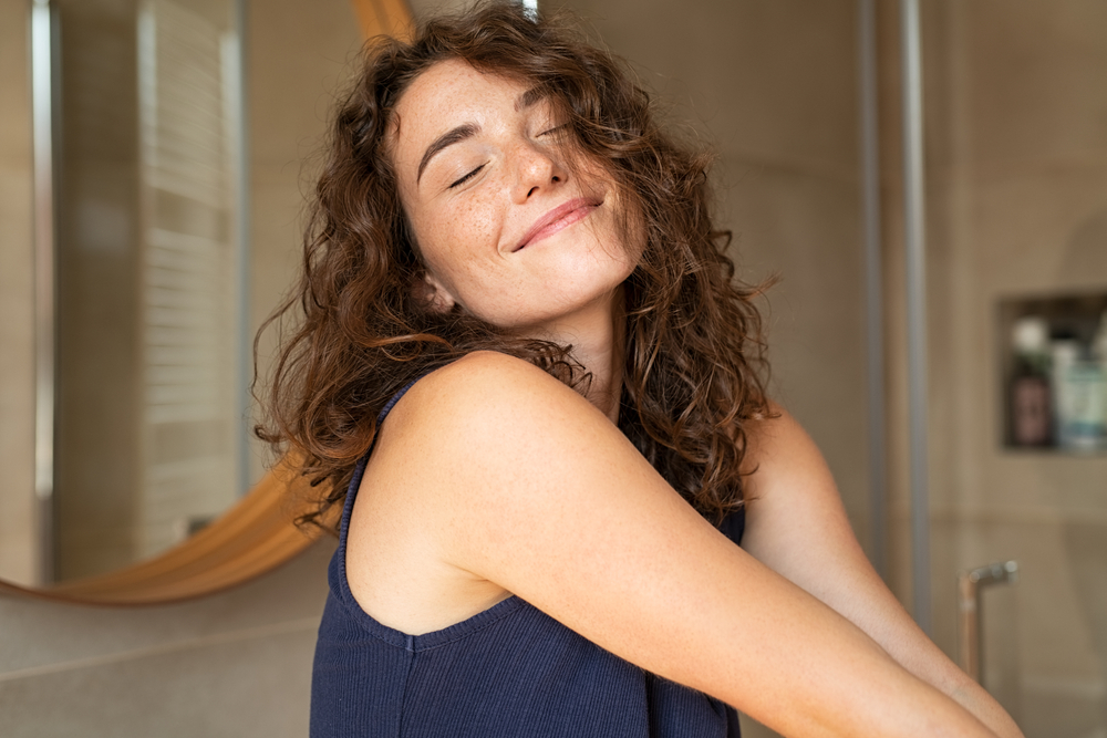 Healthy, Confident Woman After Sleep Apnea Treatment – Sleep Apnea A relaxed woman with eyes closed and a peaceful expression, symbolizing improved wellness and confidence following sleep apnea treatment – Sleep Apnea