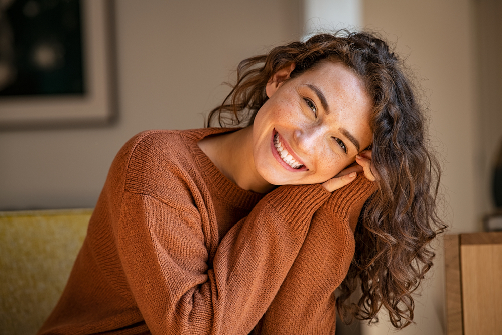 Happy Woman Smiling With Healthy Teeth – dentist in rancho mirage, ca Close-up of a smiling woman enjoying confident, healthy teeth that reflect comfortable, high-quality dental care in a relaxed setting – dentist in rancho mirage, ca